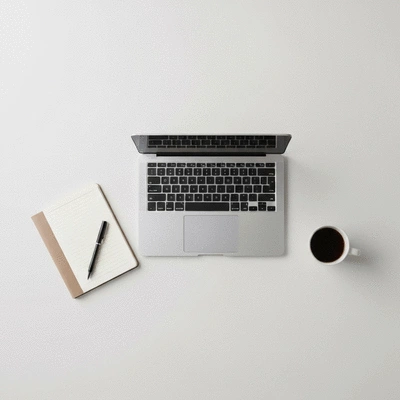 Modern workspace with laptop and coffee, representing a smooth career transition